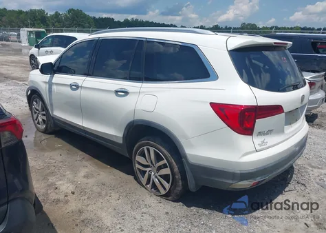 2017 Honda Pilot Touring z USA, uszkodzony, nr VIN 5FNYF5H91HB007795